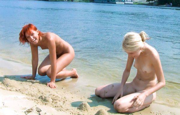 Slim and nude beach girl is trying to catch some sun as she displays her firm breasts - hclips.com on nochargetube.com