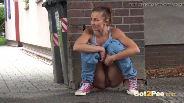 Lara Braun relieves herself in public with a walk and a pull - sexu.com on nochargetube.com