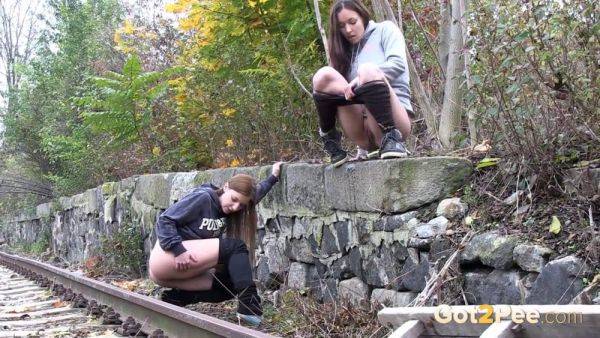 Brunette girls get desperate for a public pee session in the railway - sexu.com - Czech Republic on nochargetube.com