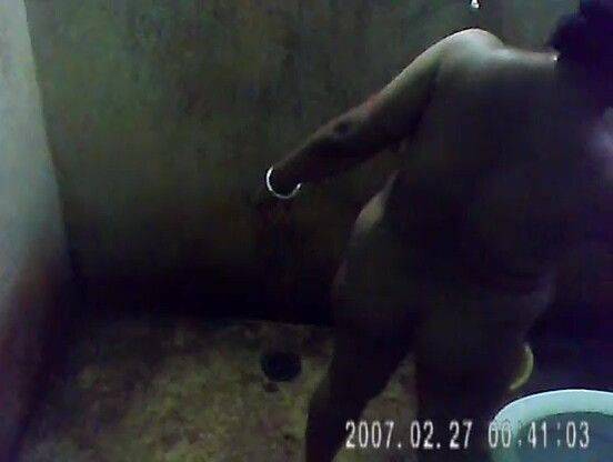 Mature Indian Bengali Bath captured in bathroom by nephew - voyeurhit.com - India on nochargetube.com