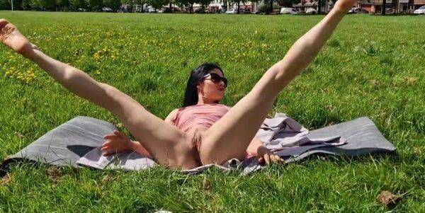 Brunette milf flashing pussy and pissing in a public park - anysex.com on nochargetube.com